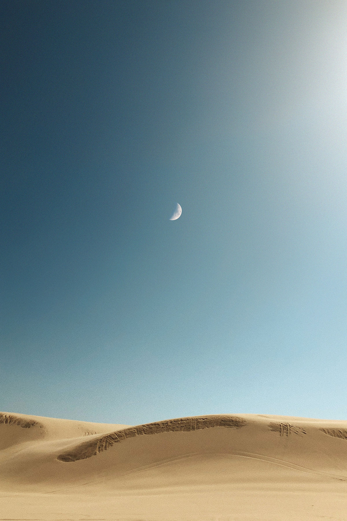 Moon over desert